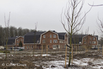 Nieuwe gebouwen geïnspireerd op de Amsterdamse School-stijl van het hoofdgebouw.
<br/>
Corrie Groen- Pickhard, 2015-01-25